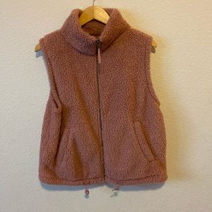SO extra large, pink, fuzzy, zip, or with pockets vest